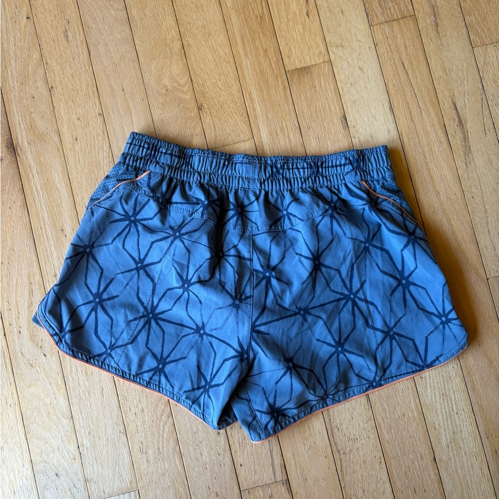 Brooks Blue Athletic Shorts with Geometric Pattern